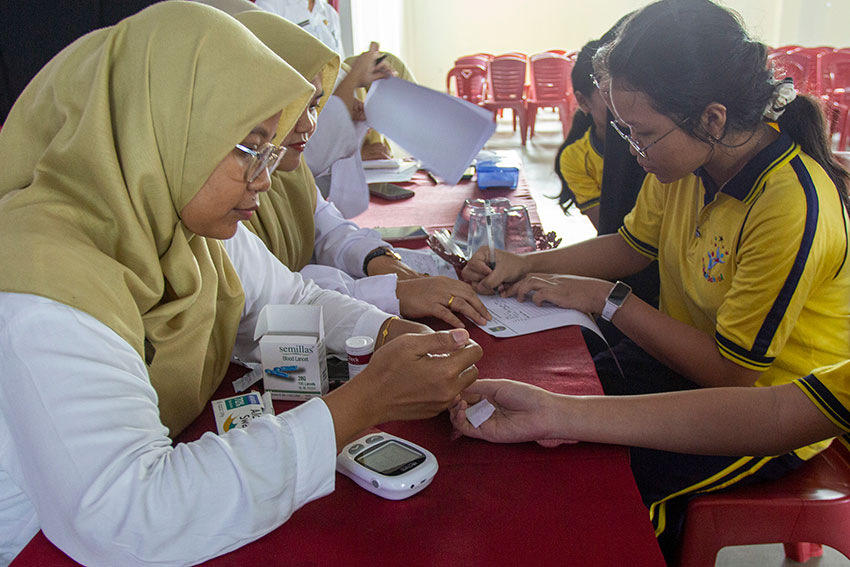 Layanan Cek Kesehatan Gratis (CKG), di Sekolah Kaliban, Batam, Kepulauan Riau, Rabu (30/7). [astakom/str-Andaru AK]