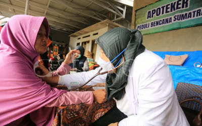 Pengecekkan Kesehatan Korban Banjir Bandang Padang