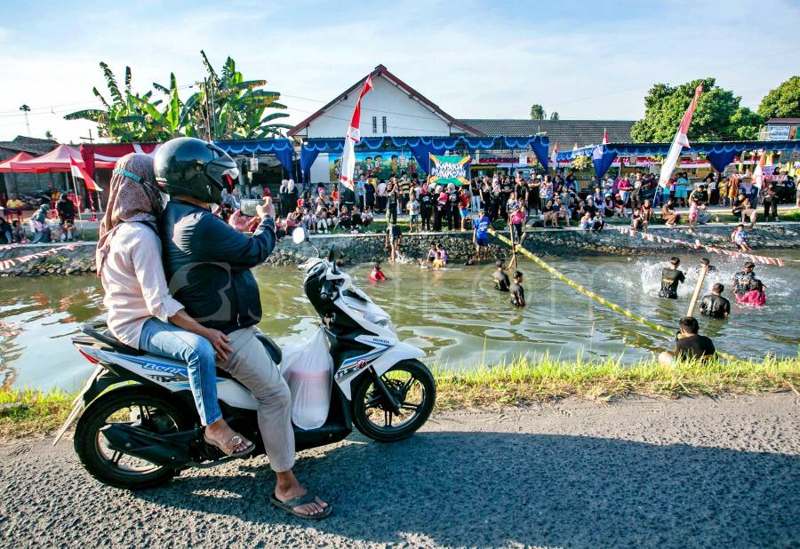 [astakom/str-Panji Arkananta]